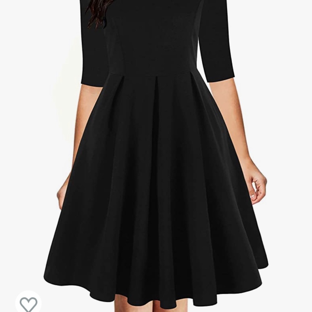 tag is still on and it has pockets! 3/4 length sleeves 65% cotton 35% polyester